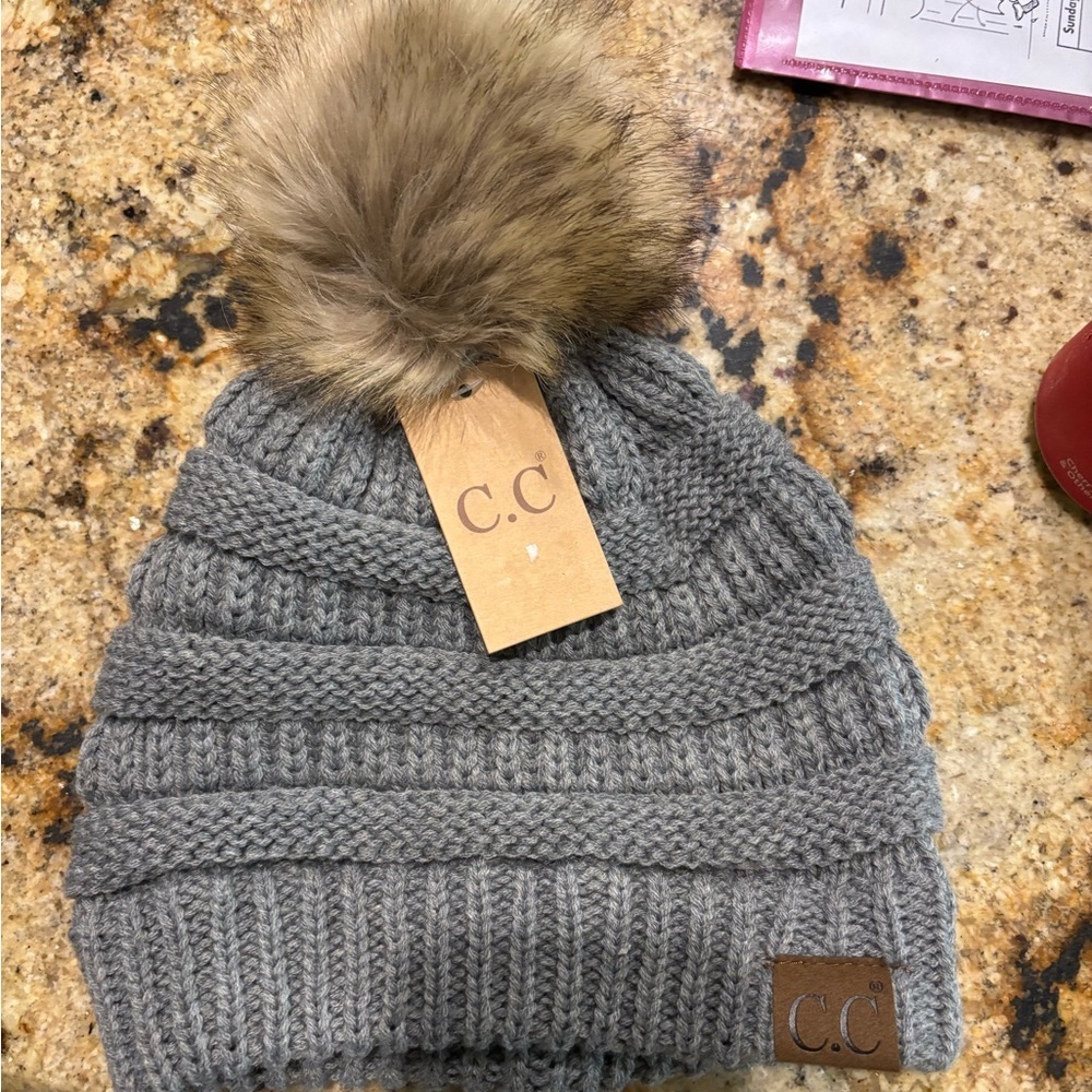 New with tag women’s C.C cable knit beanie